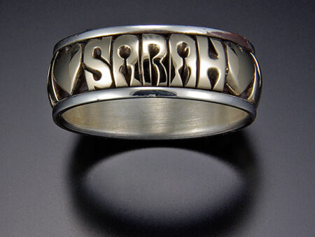 Hand-Carved 7mm 10 kt Gold Center with Stainless Steel Channel